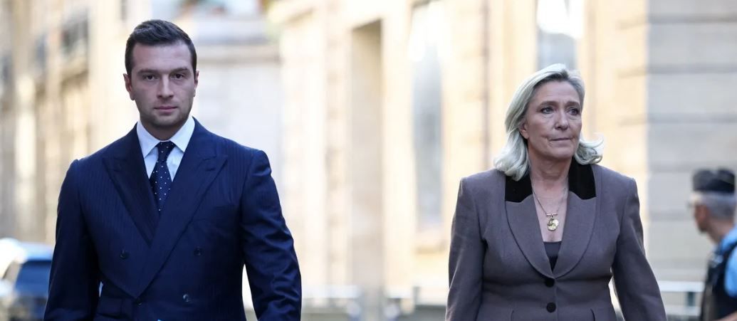 Жордан Барделла и Марин Ле Пен / Reuters