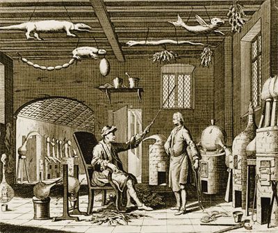 Лаборатория XVIII века. Учёный инструктирует своего ассистента