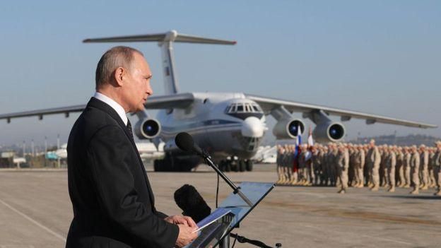 GETTY IMAGES Image caption 11 декабря президент Владимир Путин объявил на базе Хмеймим о победе в сирийской войне