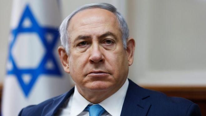 AFP/GETTY IMAGES Image caption Сообщается, что Нетаньяху несколько раз встречался со следователями