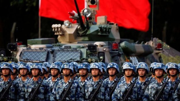 REUTERS Image caption В прошлом году Китай открыл свою первую военную базу за рубежом