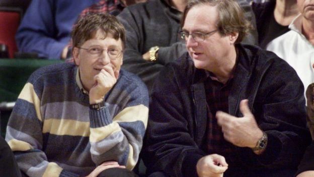 REUTERS Image caption Билл Гейтс (слева) и Пол Аллен на игре NBA в 2003 году