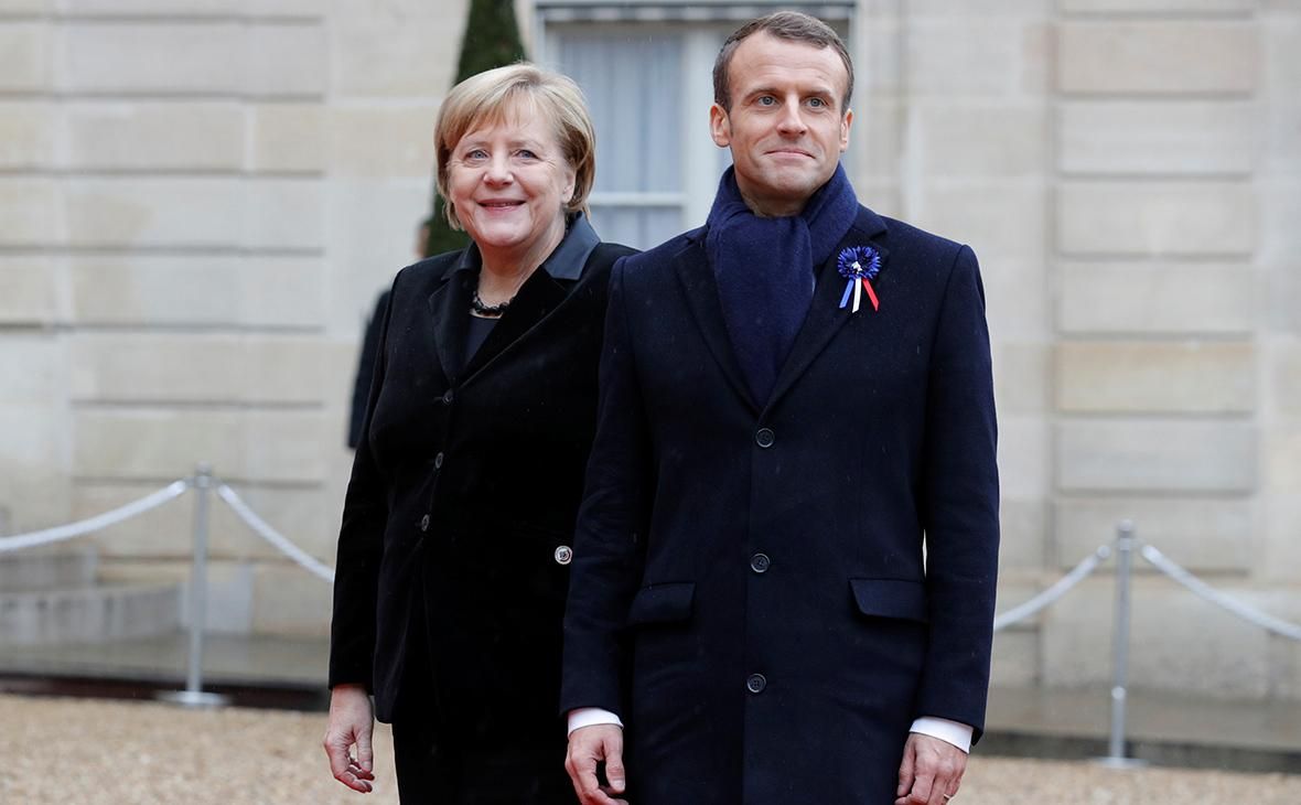 Ангела Меркель и Эмманюэль Макрон (Фото: Philippe Wojazer / Reuters)