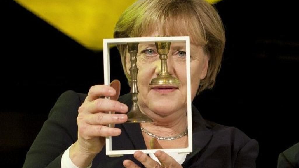 В минувшем году зафиксировано самое большое количество «антисемитских актов» за последние 10 лет. На фото: Ангела Меркель получает премию «За взаимопонимание и толерантность» в Еврейском музее Берлина. 2011 г. AFP PHOTO / POOL / MICHAEL GOTTSCHALK