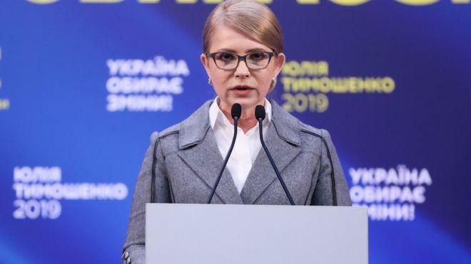 OLEG PETRASYUK/TASS Image caption Тимошенко назвала выборы фарсом