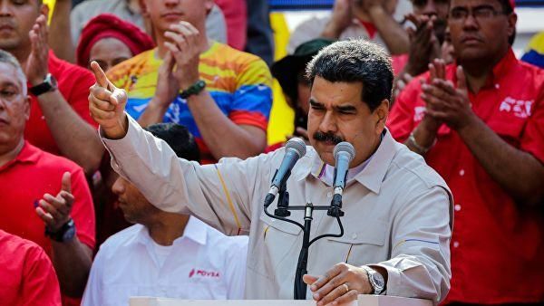 © РИА Новости / Стрингер Президент Венесуэлы Николас Мадуро выступает в Каракасе на акции своих сторонников. 6 апреля 2019
