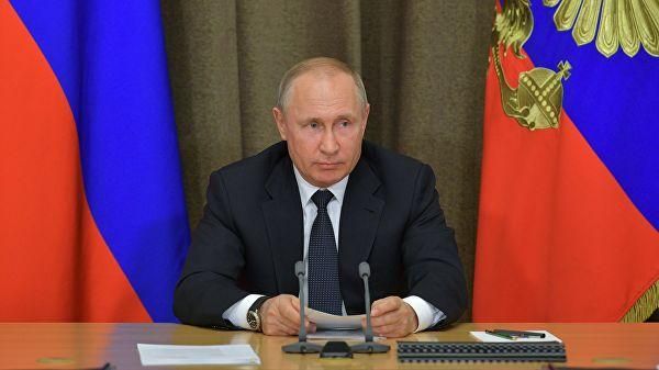 © РИА Новости / Алексей Дружинин Президент РФ Владимир Путин. Архивное фото