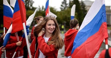 © РИА Новости / Александр Кряжев Российские флаги. Архивное фото