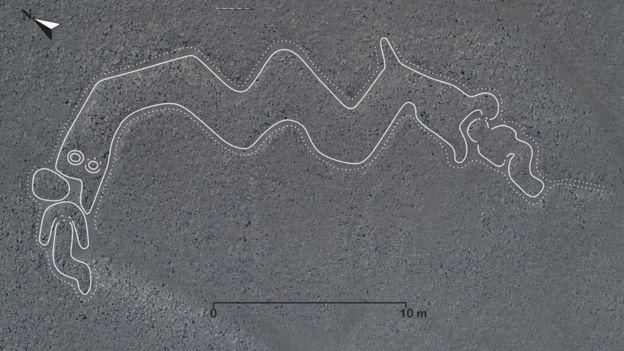 YAMAGATA UNIVERSITY Image caption Двухголовая змея, пожирающая людей