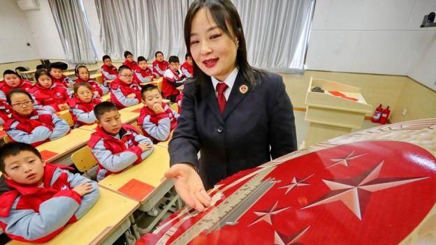 AFP Image caption Школы крупнейших городов Китая, а также Сингапур, Макао и Гонконг заняли первые строчки мирового рейтинга