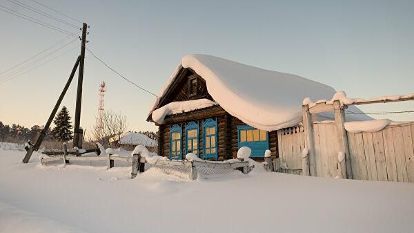 © РИА Новости / Алексей Мальгавко Жилой дом в селе