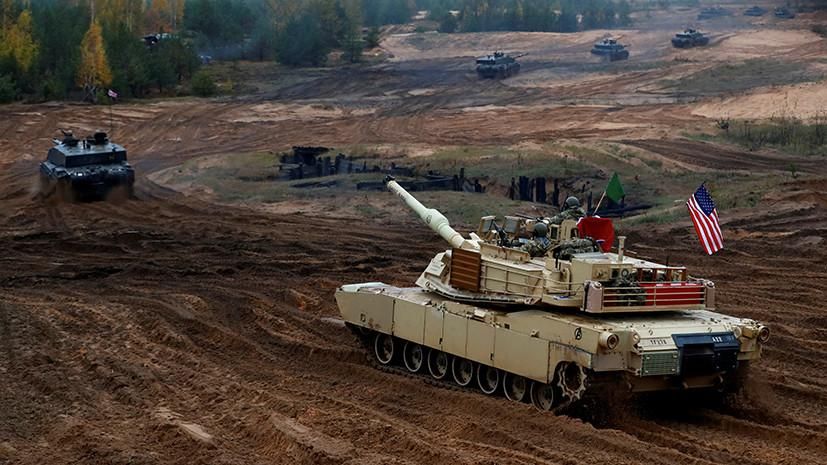 Американские танки Abrams в ходе учений «Железный томагавк» на Адажском полигоне в Латвии Reuters © Ints Kalnins