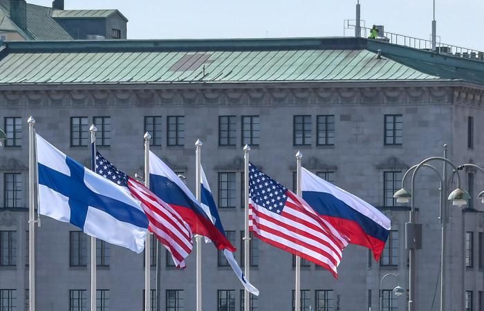 Флаги Финляндии, США и России в Хельсинки во время российско-американского саммита в 2018 году Фото: EPA/Vostock-photo