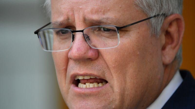EPA Подпись к фото, Австралийский премьер назвал пост отвратительным и потребовал от Китая извинений