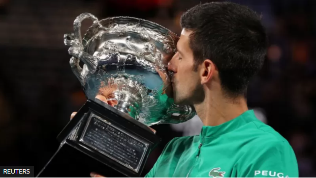 REUTERS Подпись к фото, В прошлом году Джокович в девятый раз выиграл Australian Open