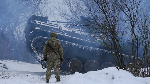 © AP Photo / Vadim Ghirda Украинские военные в Луганской области
