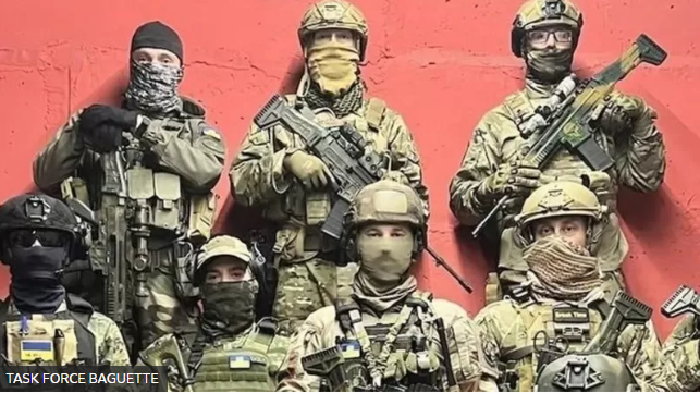 TASK FORCE BAGUETTE Подпись к фото, Александр Дрюке и Энди Хьюн приехали добровольцами в Украину, где вступили в отряд таких же доровольцев из разных стран. Из-за смешанного состава он получил интернациональное название "Багет"